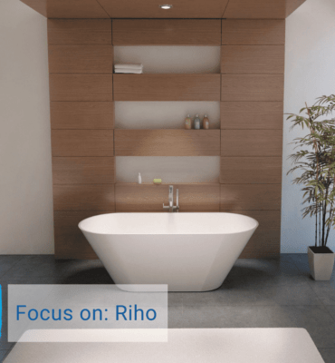Riho bathroom with freestanding bath, furniture and mirror