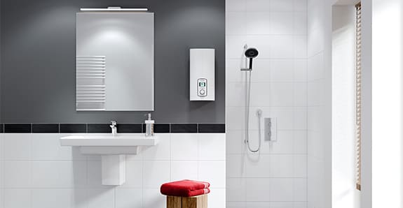 bathroom with small heater near the shower