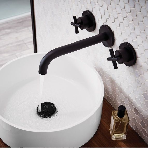 bathroom black and gold taps trend