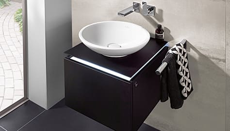 Countertop washbasin with wall mounted bathroom tap