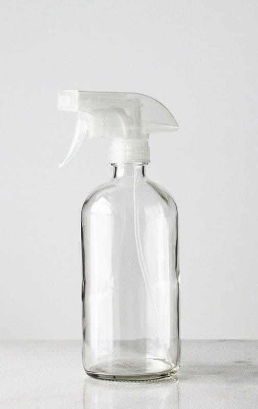 homemade spray in a glass bottle
