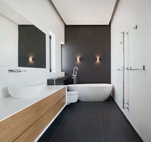 white and dark brown bathroom with freestanding bath