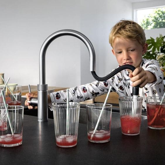 quooker tap used by a child