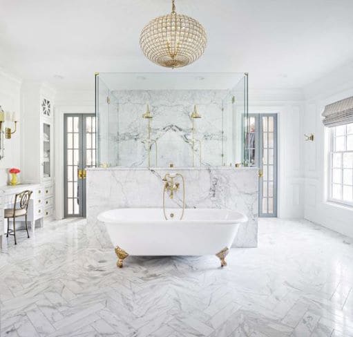 white spacious bathroom with freestanding bathtub