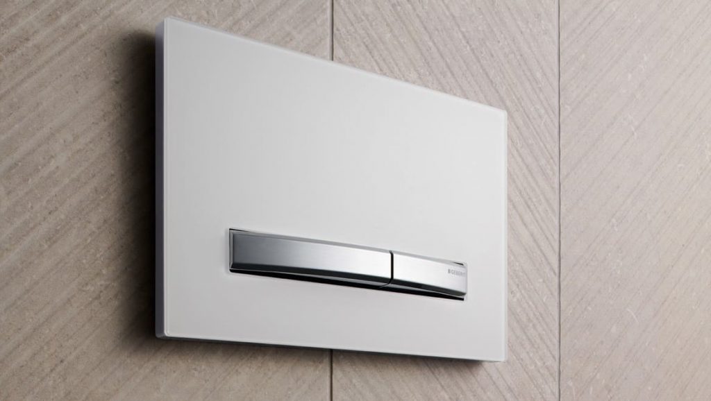 grey or silver toilet push button panel Geberit Sigma
